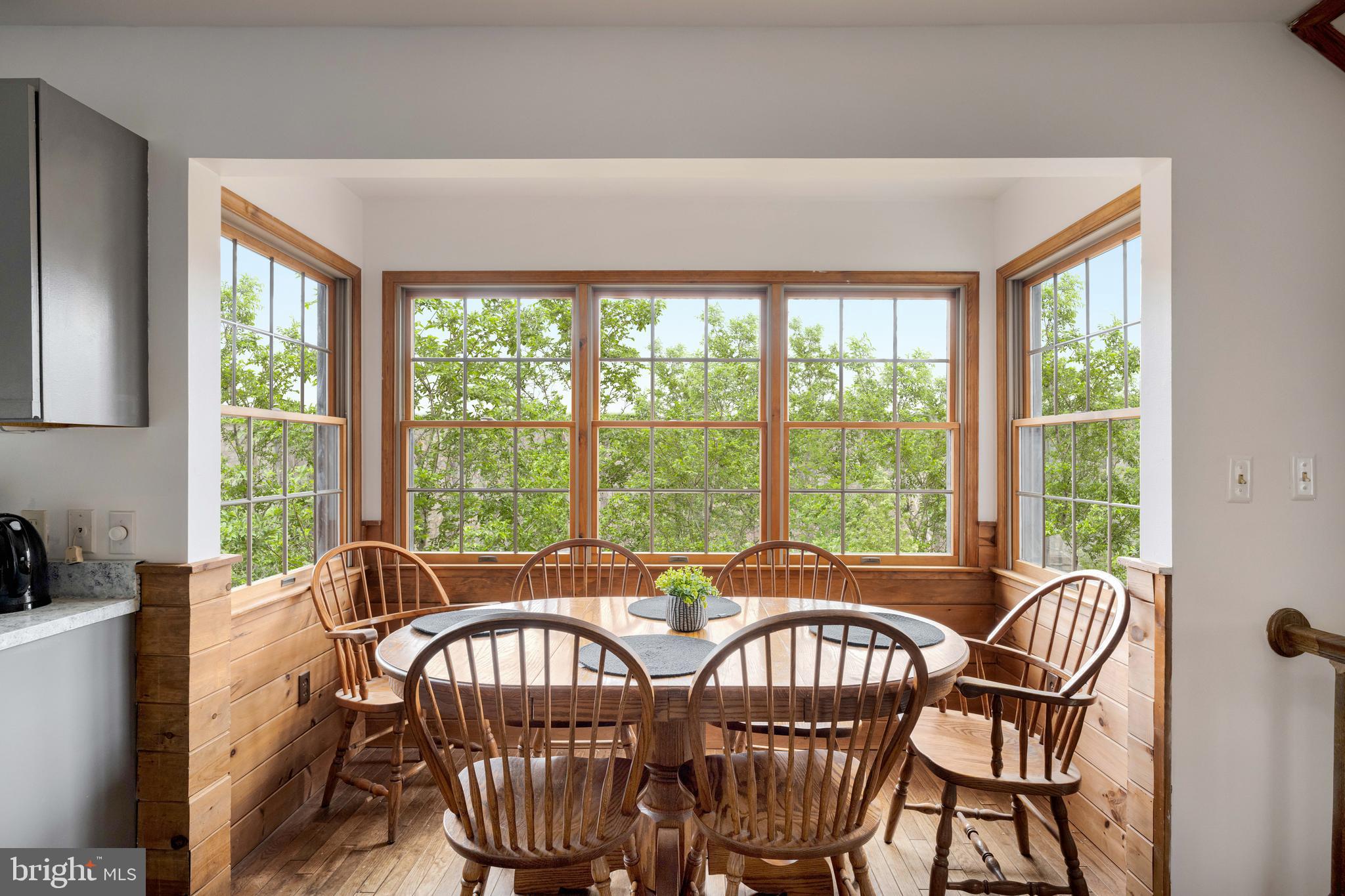 170 Cardinal Lane Berkeley Springs, WV 25411 - Photo 12 of 26 a view of a dining room with furniture window and outside view