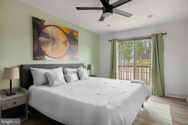 a bedroom with a bed and dresser