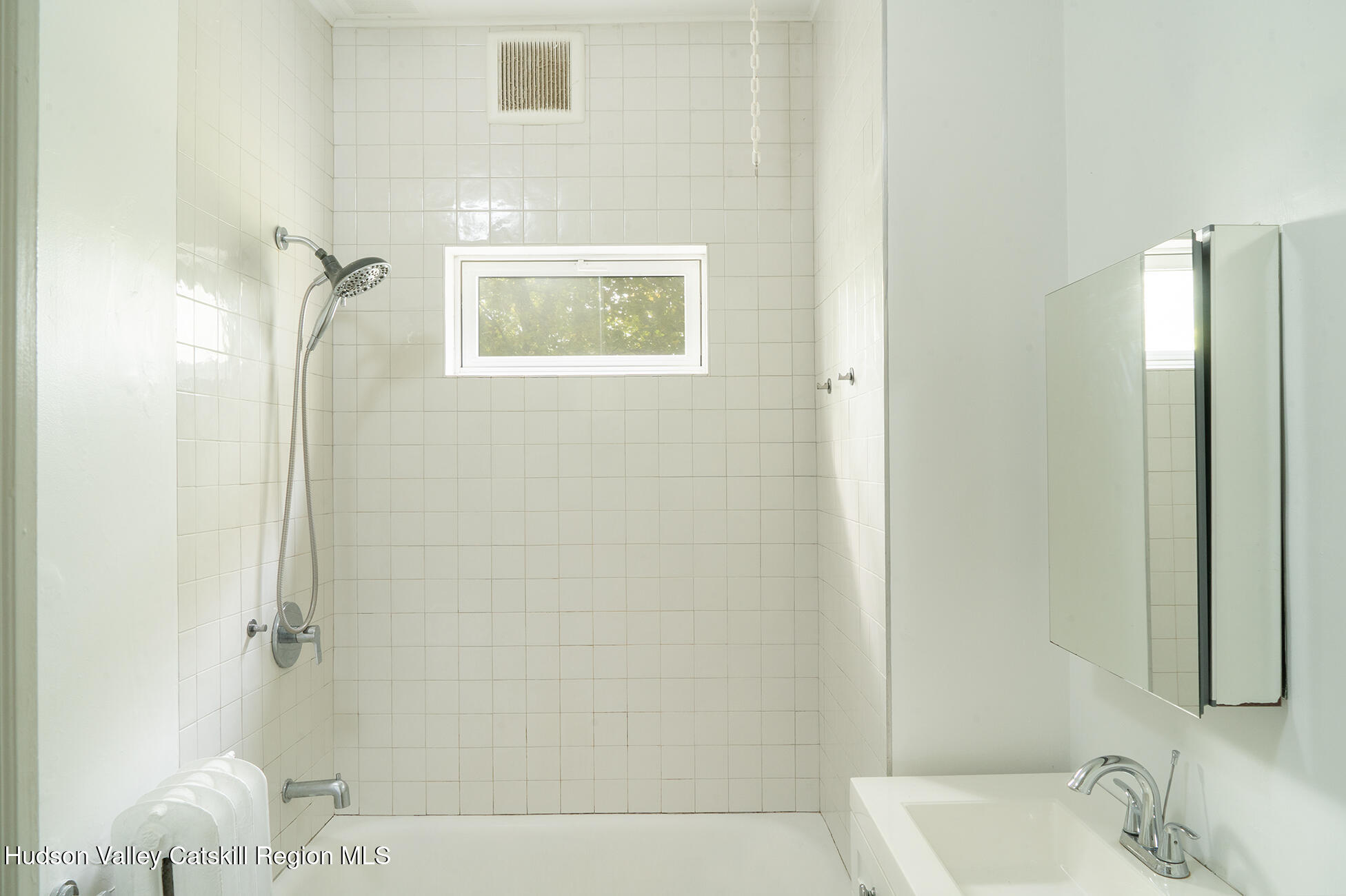 267 Main Street Catskill, NY 12414 - Photo 20 of 29 a bathroom with a tub and shower