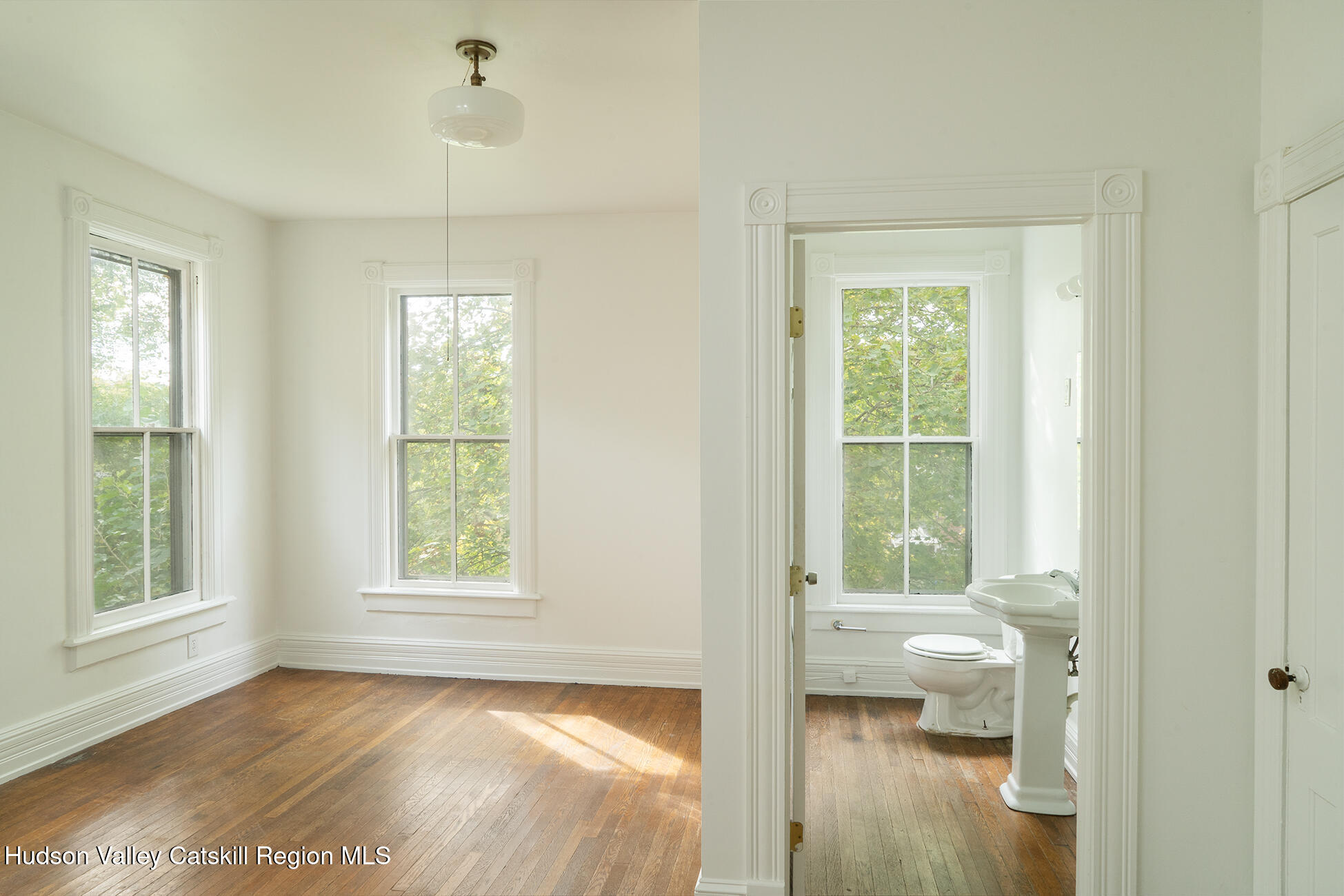 267 Main Street Catskill, NY 12414 - Photo 24 of 29 a view of a bedroom with a large window