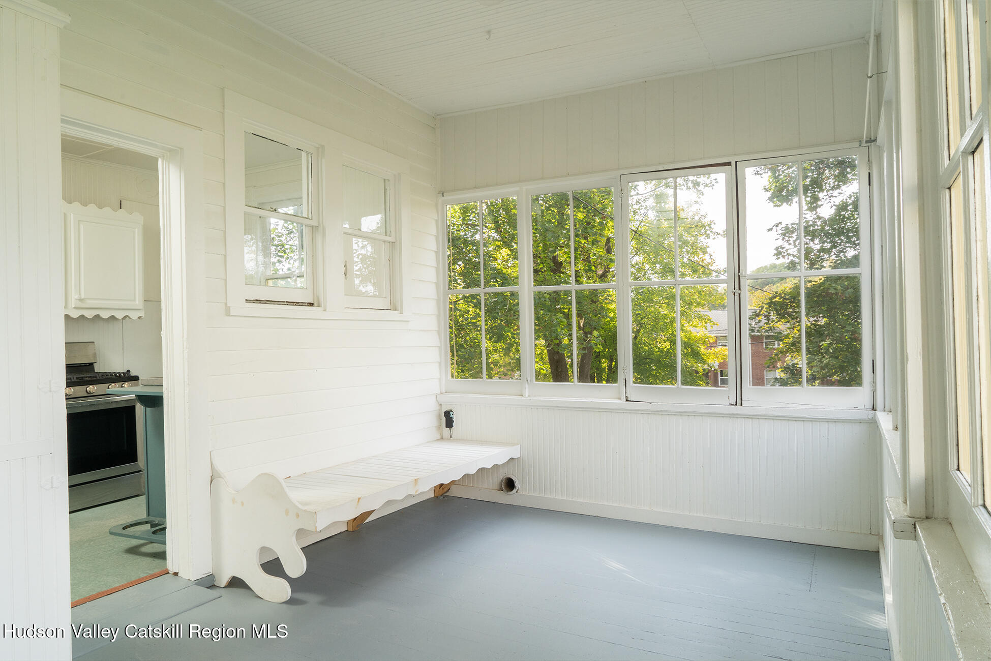 267 Main Street Catskill, NY 12414 - Photo 9 of 29 a bathroom with a bathtub and a window