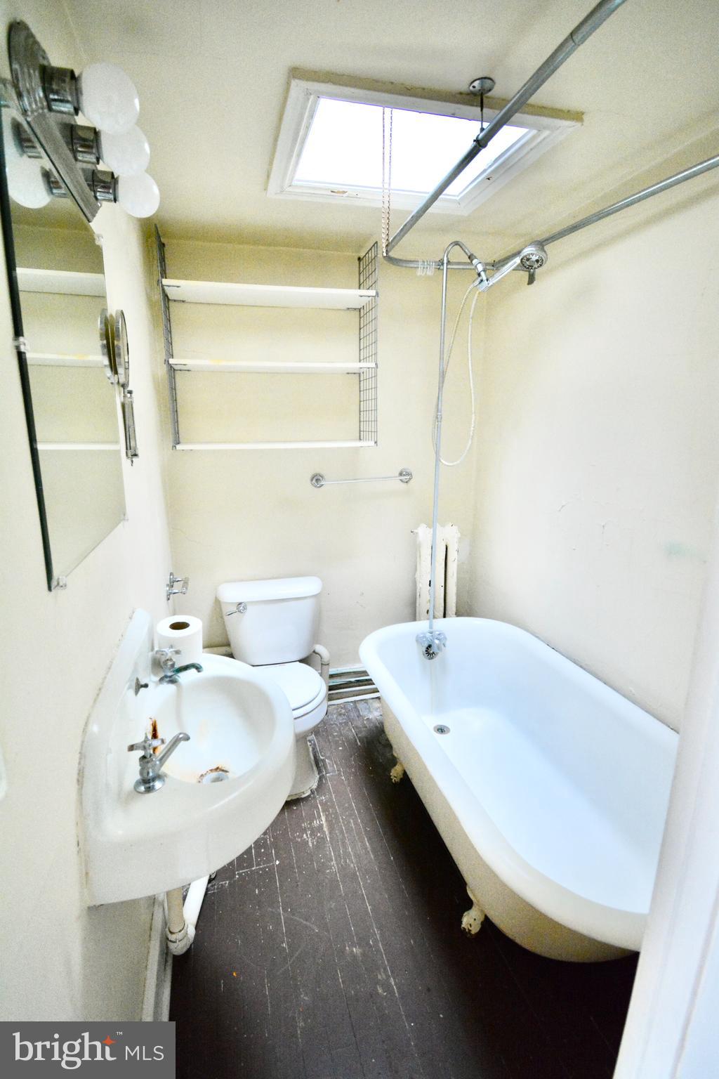 38 West Seymour Street, Unit 3 Philadelphia, PA 19144 - Photo 11 of 11 a bathroom with a sink and a mirror