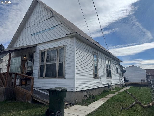 1787 Valley Avenue Baker City, OR 97814 - Photo 2 of 13 a view of a house with backyard