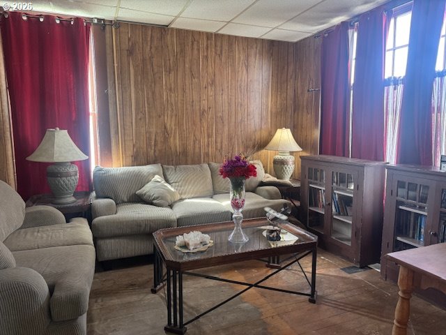 1787 Valley Avenue Baker City, OR 97814 - Photo 8 of 13 a living room with furniture a chandelier and a window