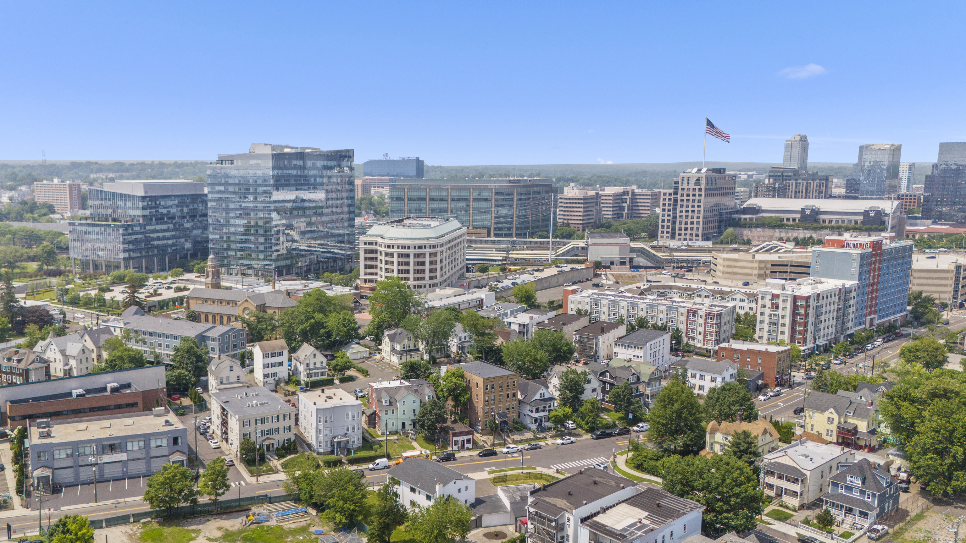a view of city with tall buildings