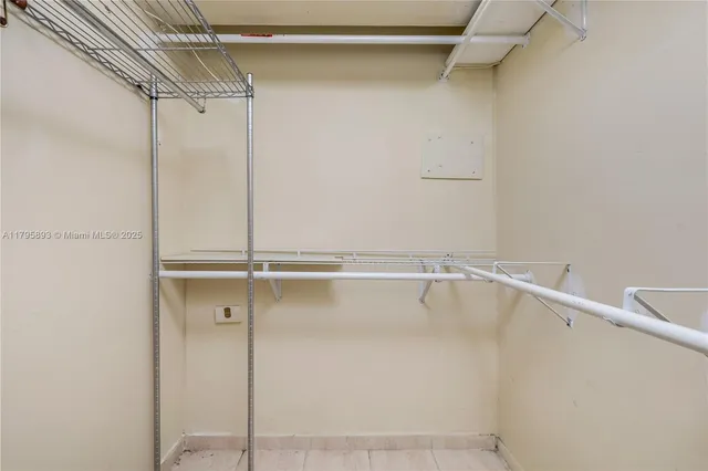 a view of an empty walk in closet