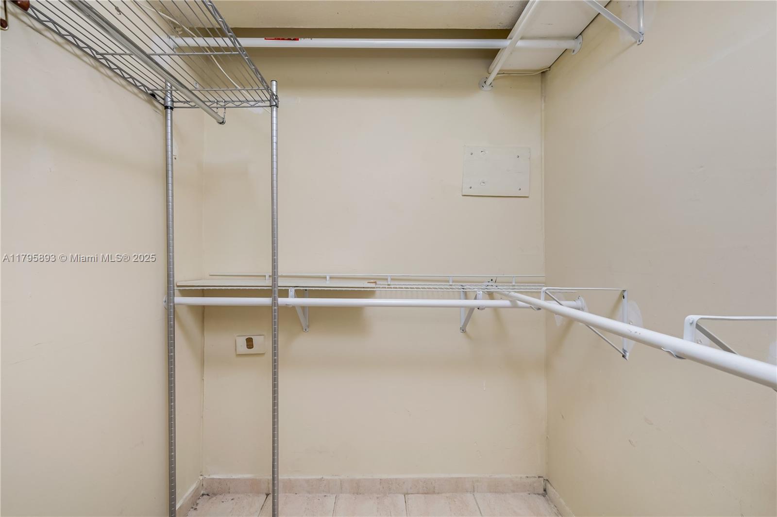345 Ocean Drive, Unit 904 Miami Beach, FL 33139 - Photo 15 of 36 a view of an empty walk in closet