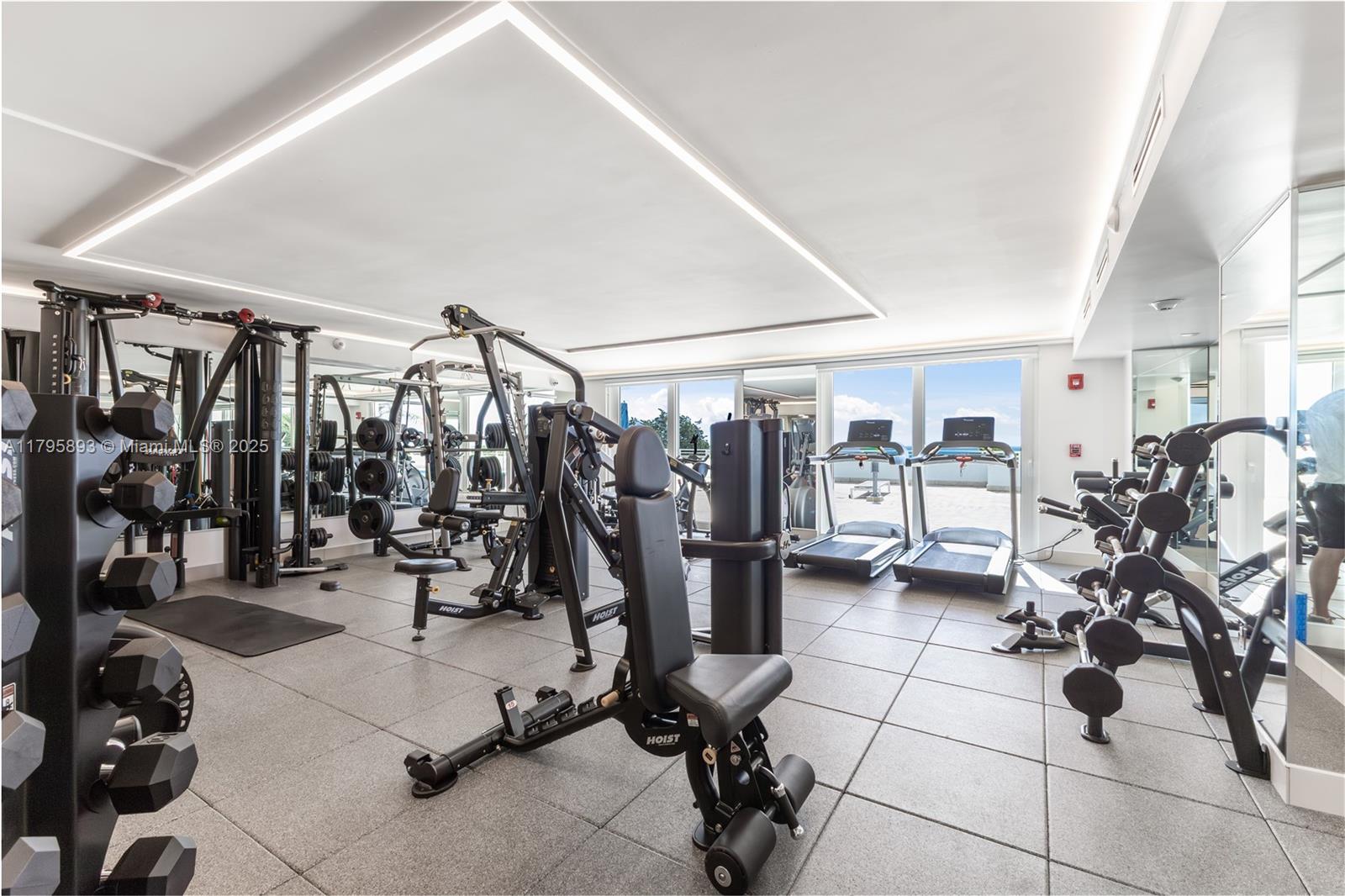 345 Ocean Drive, Unit 904 Miami Beach, FL 33139 - Photo 34 of 36 a view of a room with gym equipment