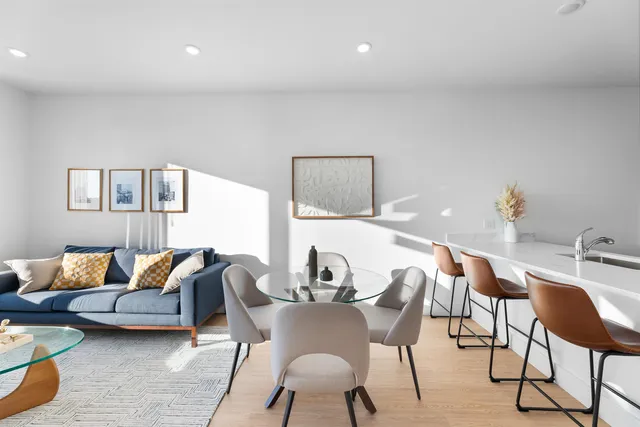 a living room with furniture and a couch