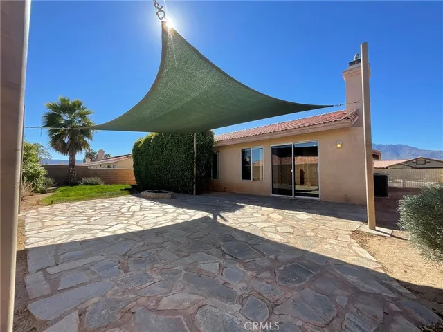 a view of a house with a patio