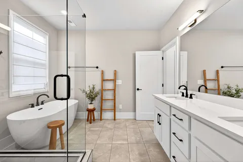 a bathroom with a sink and a bathtub