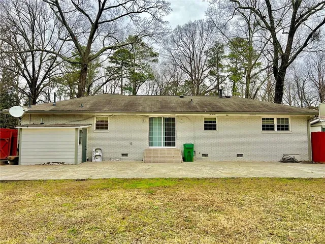 a view of a house with a swimming pool