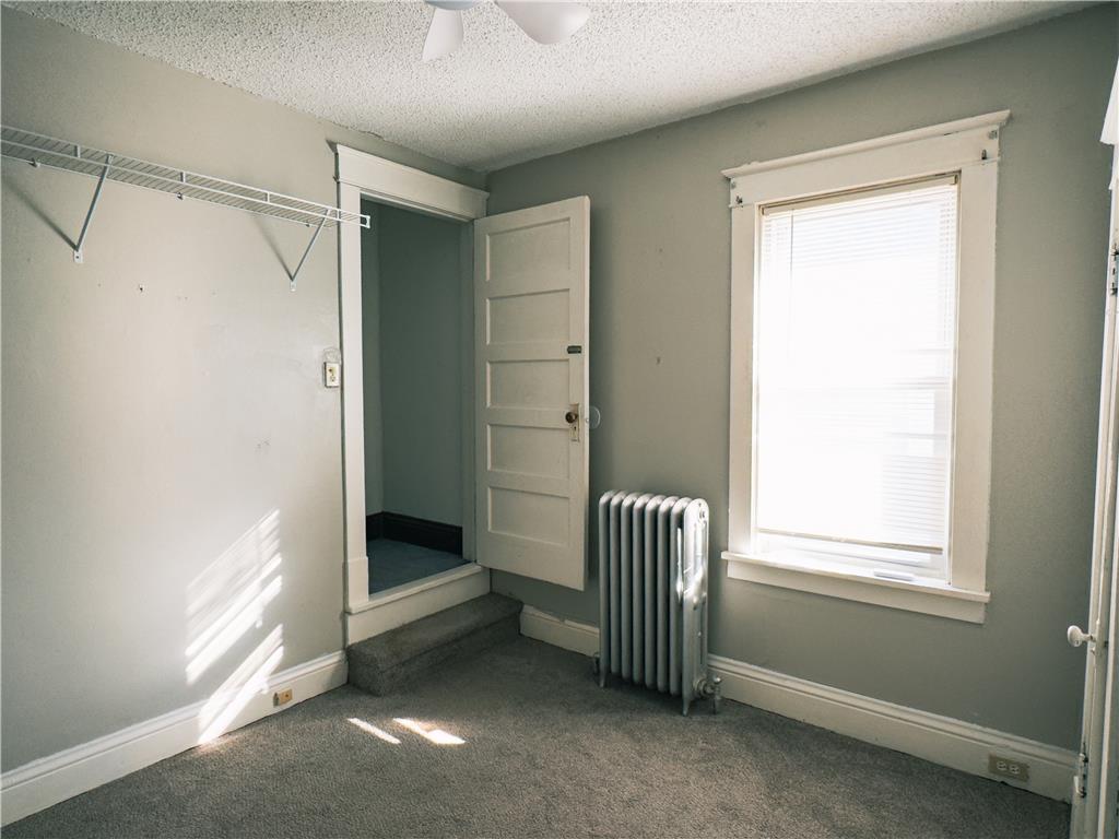 870 Chestnut Street Coplay, PA 18037 - Photo 13 of 24 A well-lit bedroom offering a cozy retreat with ample natural light.