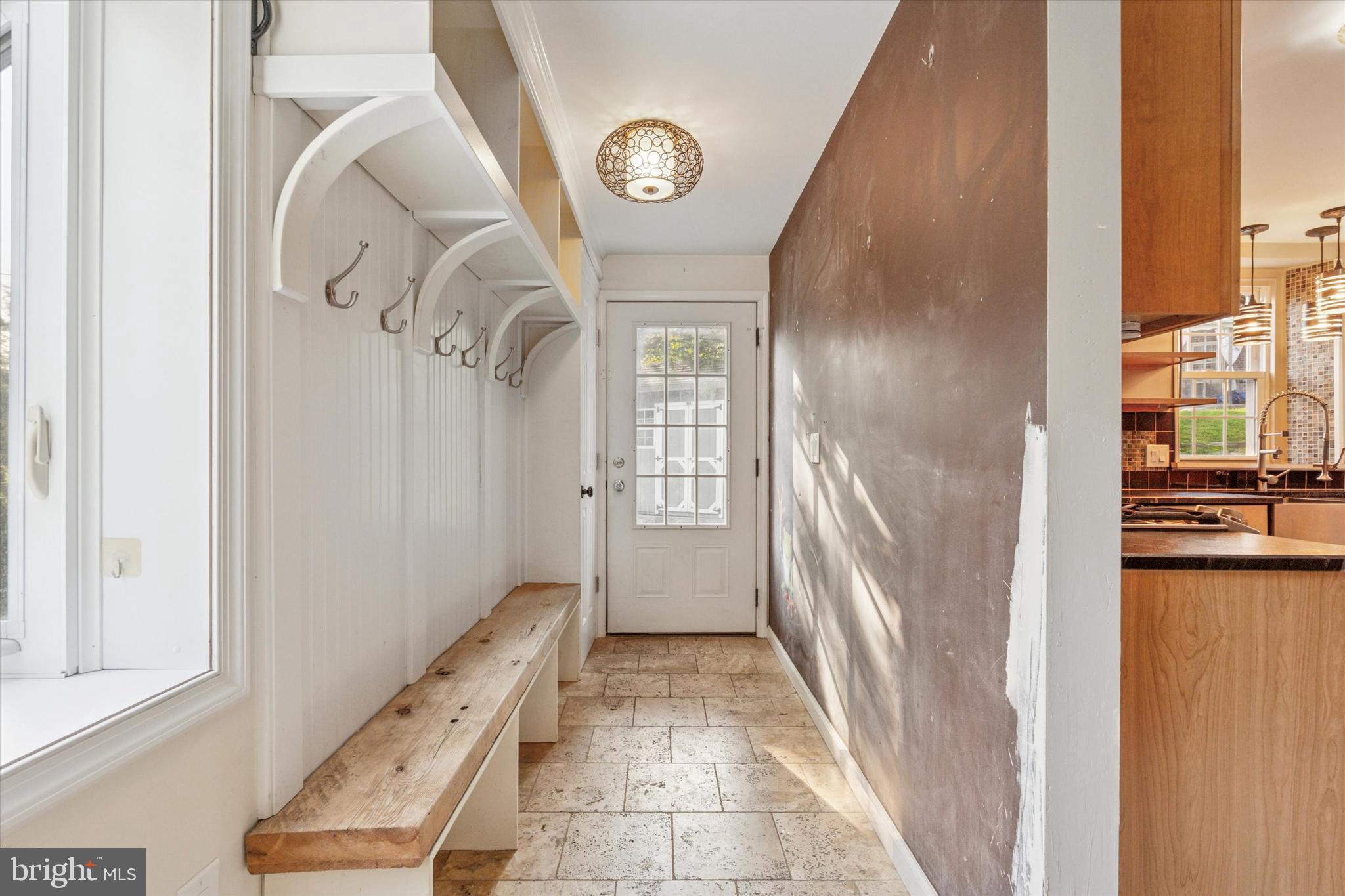 504 Plymouth Road Glenside, PA 19038 - Photo 15 of 28 a view of a hallway with windows