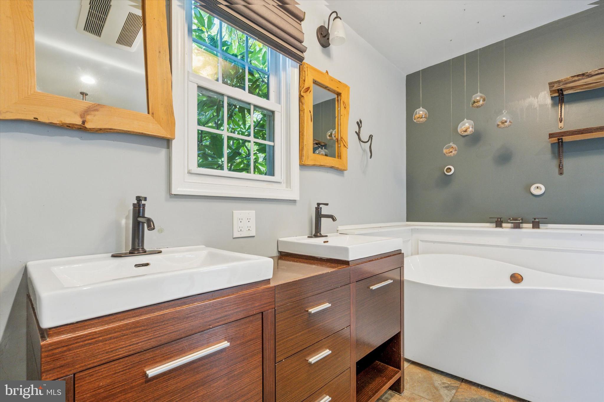 504 Plymouth Road Glenside, PA 19038 - Photo 16 of 28 a bathroom with a sink and a mirror
