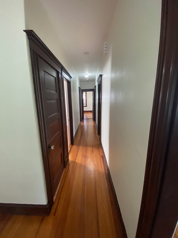 14 Welton Road Boston, MA 02132 - Photo 11 of 31 wooden floor in a gallery
