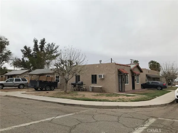 a view of multiple houses with a yard