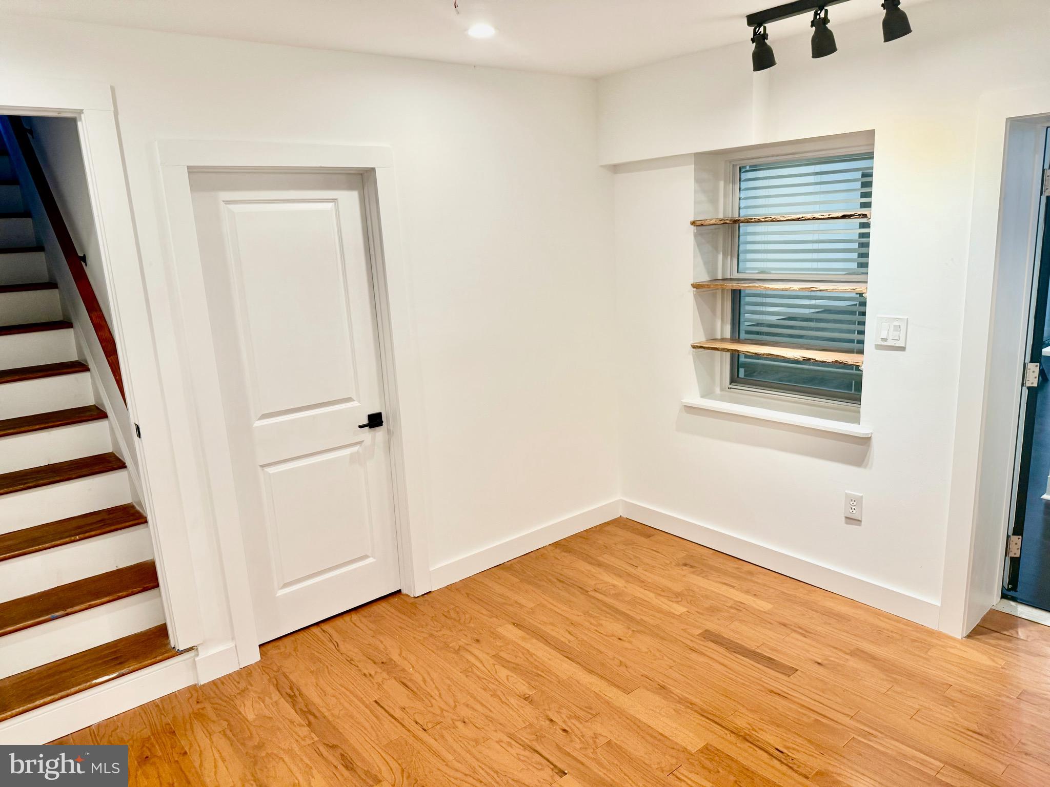3408 Cheverly Avenue Cheverly, MD 20785 - Photo 14 of 46 a view of a room with wooden floor and white walls