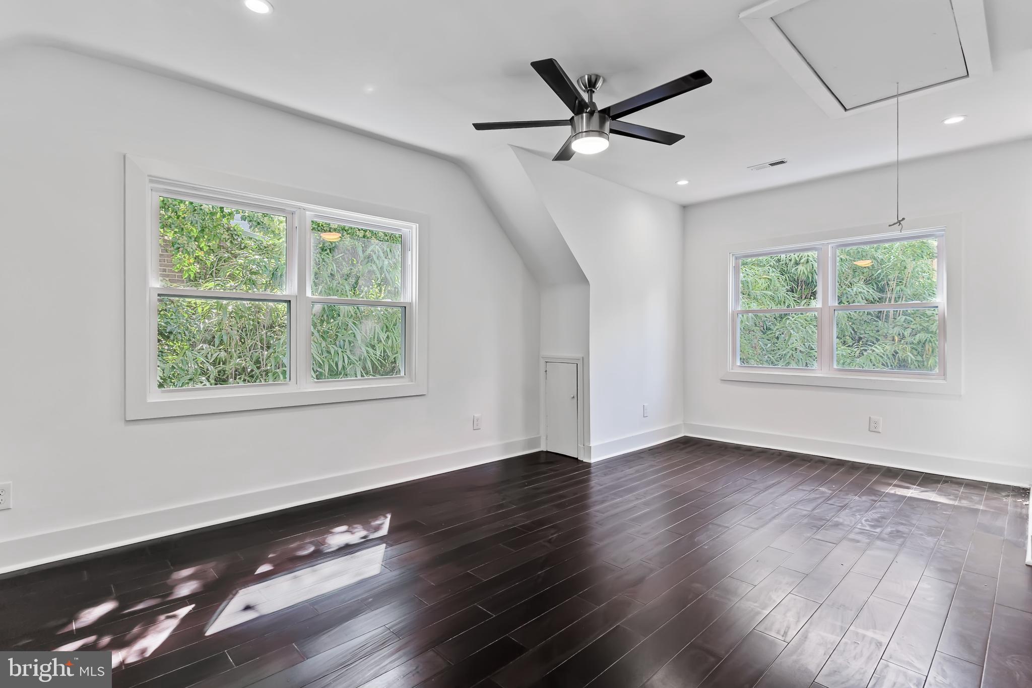 3408 Cheverly Avenue Cheverly, MD 20785 - Photo 21 of 46 a view of an empty room with wooden floor and a window