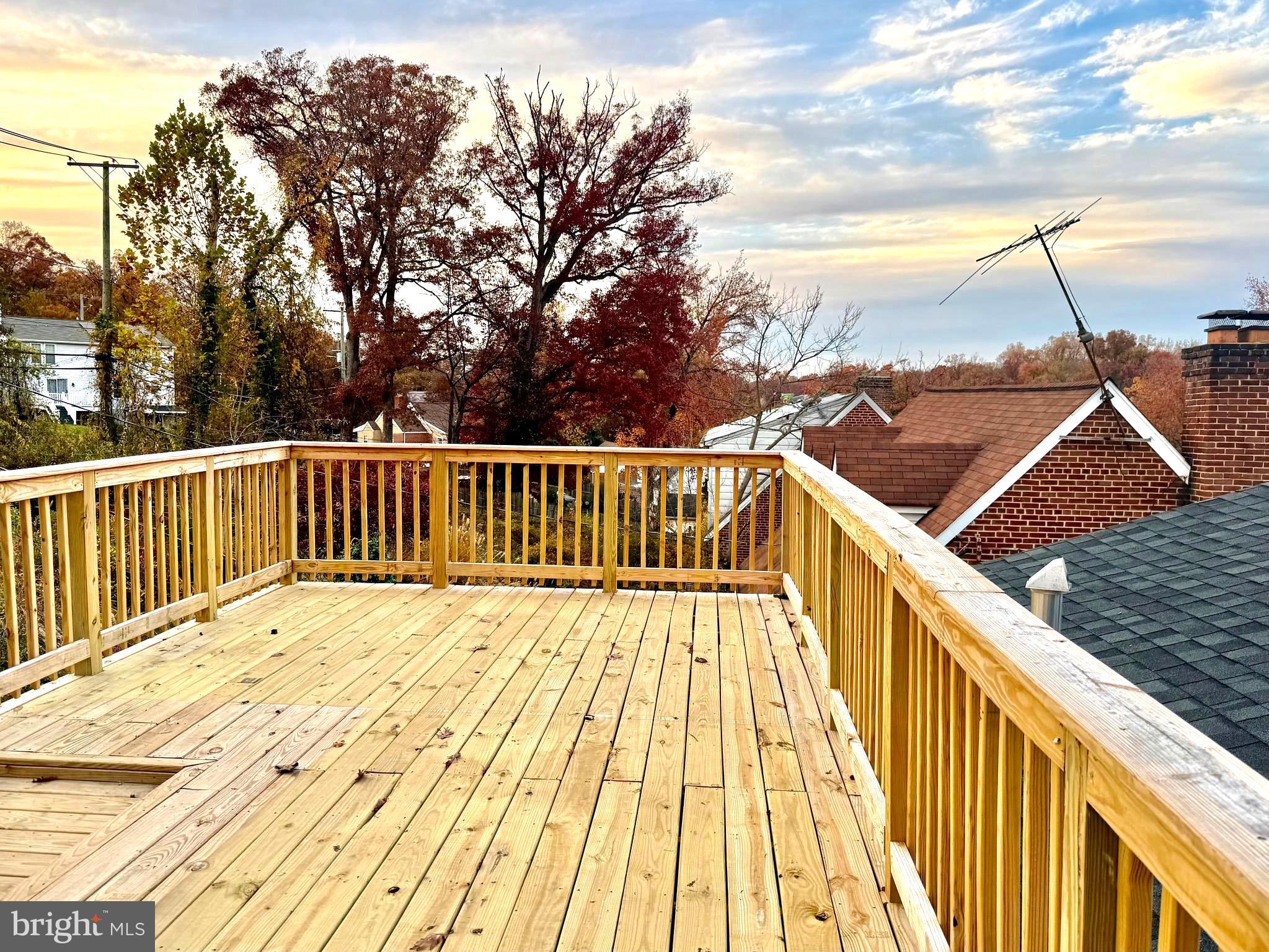 3408 Cheverly Avenue Cheverly, MD 20785 - Photo 39 of 46 a view of balcony with wooden floor and fence