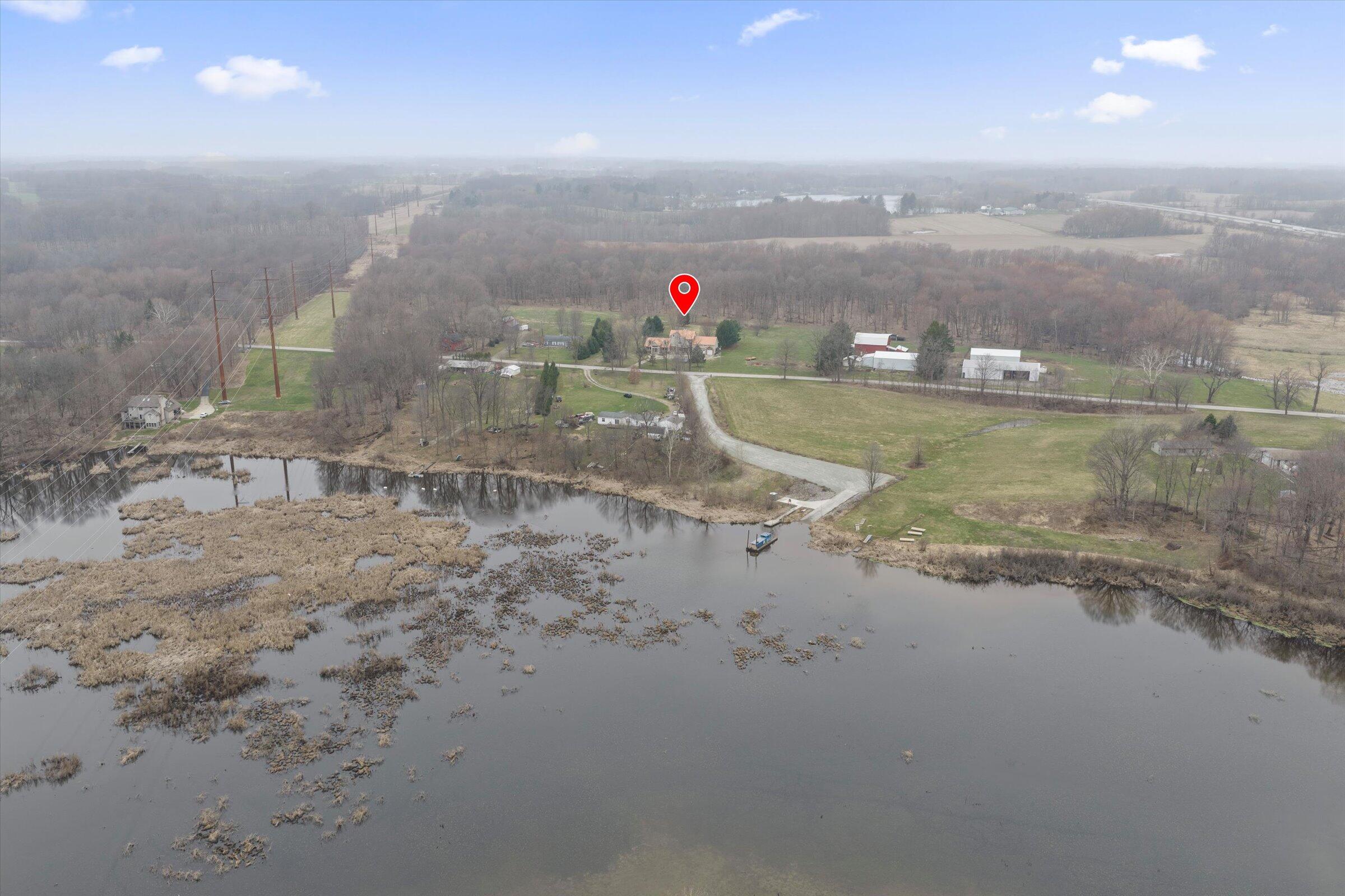7692 North Emery Road Rolling Prairie, IN 46371 - Photo 65 of 69 a view of a lake view