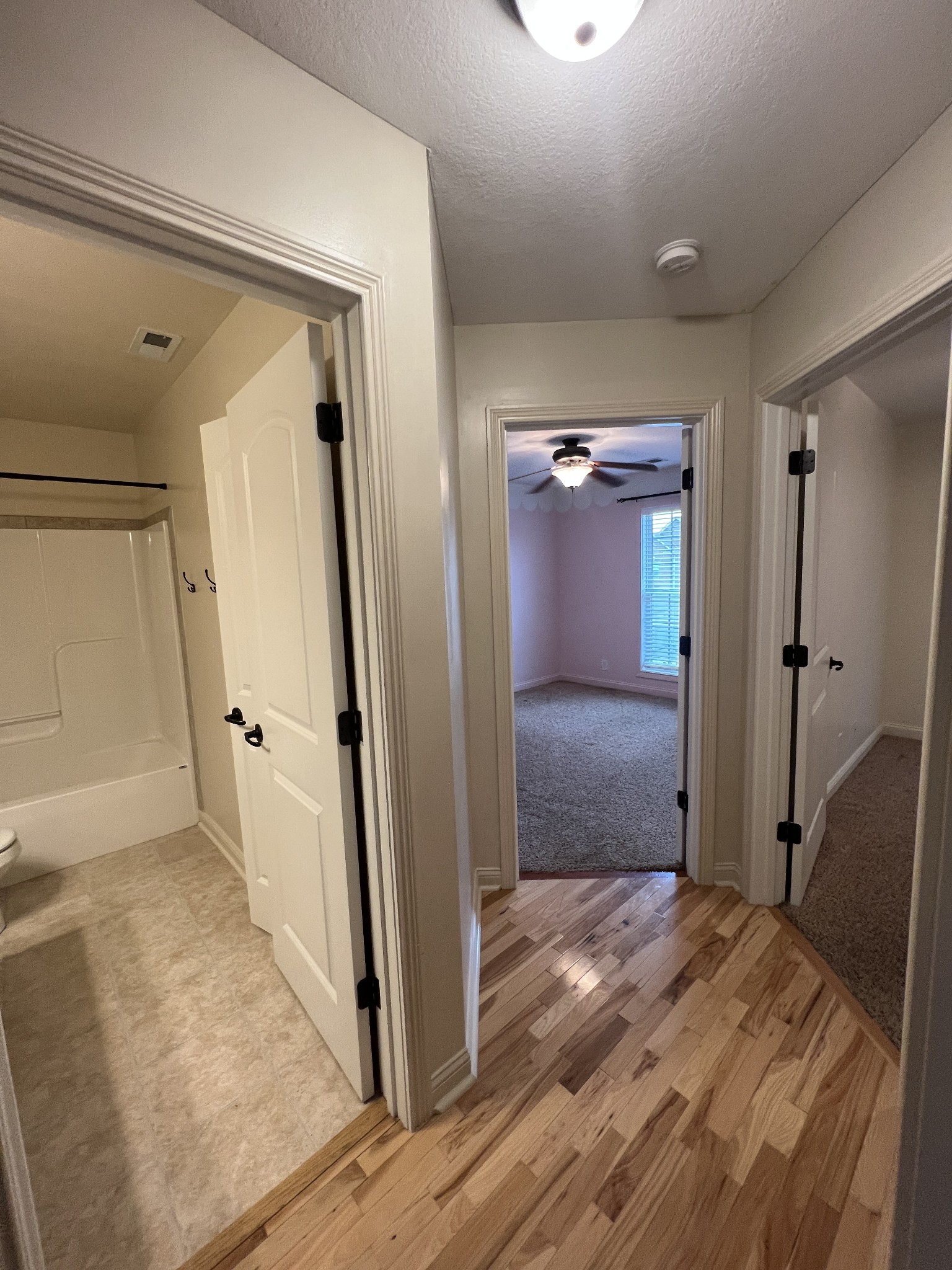1745 Apache Way Clarksville, TN 37042 - Photo 11 of 28 a view of a hallway view with wooden floor and staircase