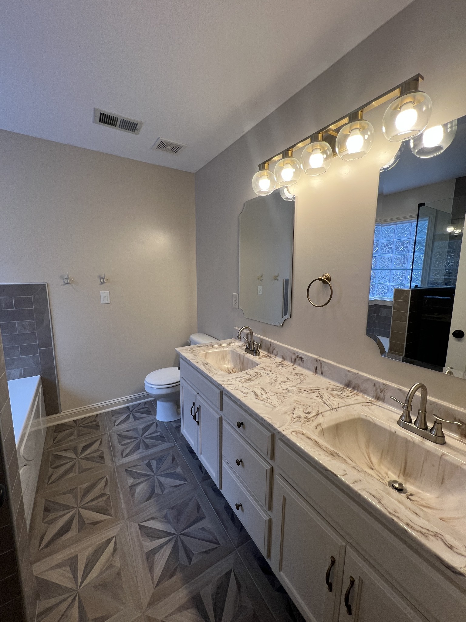 1745 Apache Way Clarksville, TN 37042 - Photo 19 of 28 a bathroom with a granite countertop sink and a mirror