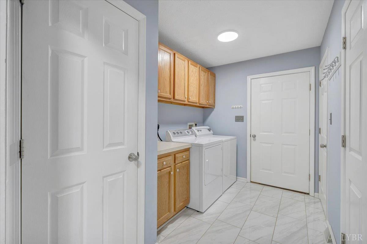 5129 Wheatland Road Bedford, VA 24523 - Photo 21 of 51 a bathroom with a sink a mirror and a bathtub