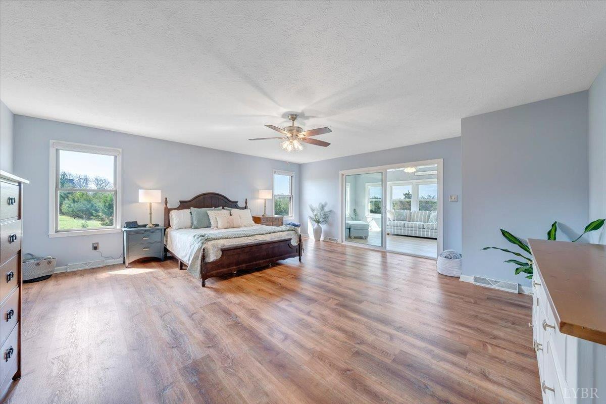 5129 Wheatland Road Bedford, VA 24523 - Photo 24 of 51 a bedroom with a bed and window