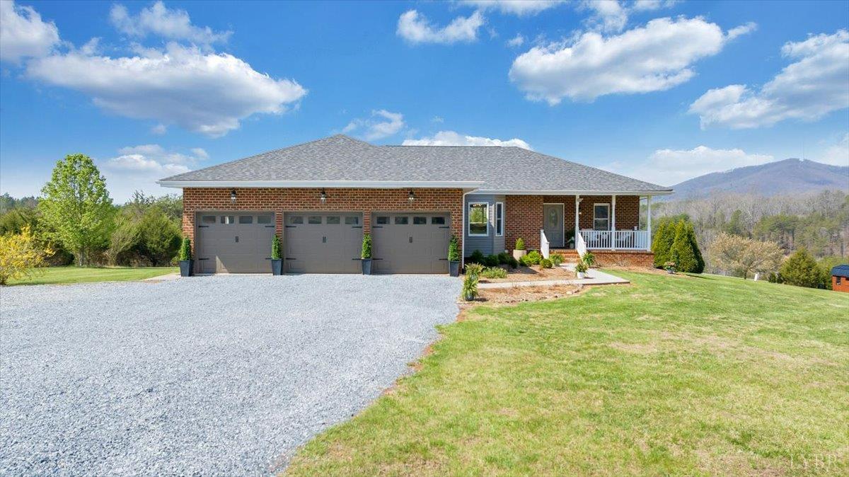 5129 Wheatland Road Bedford, VA 24523 - Photo 7 of 51 a view of a house with backyard and sitting area