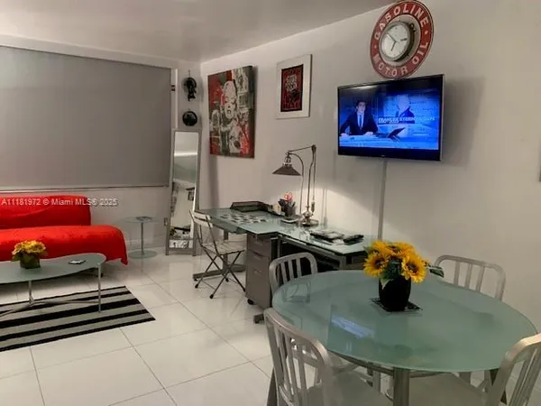 a room with furniture and wooden floor