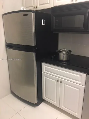 a close view of a stove top oven sitting inside of a kitchen
