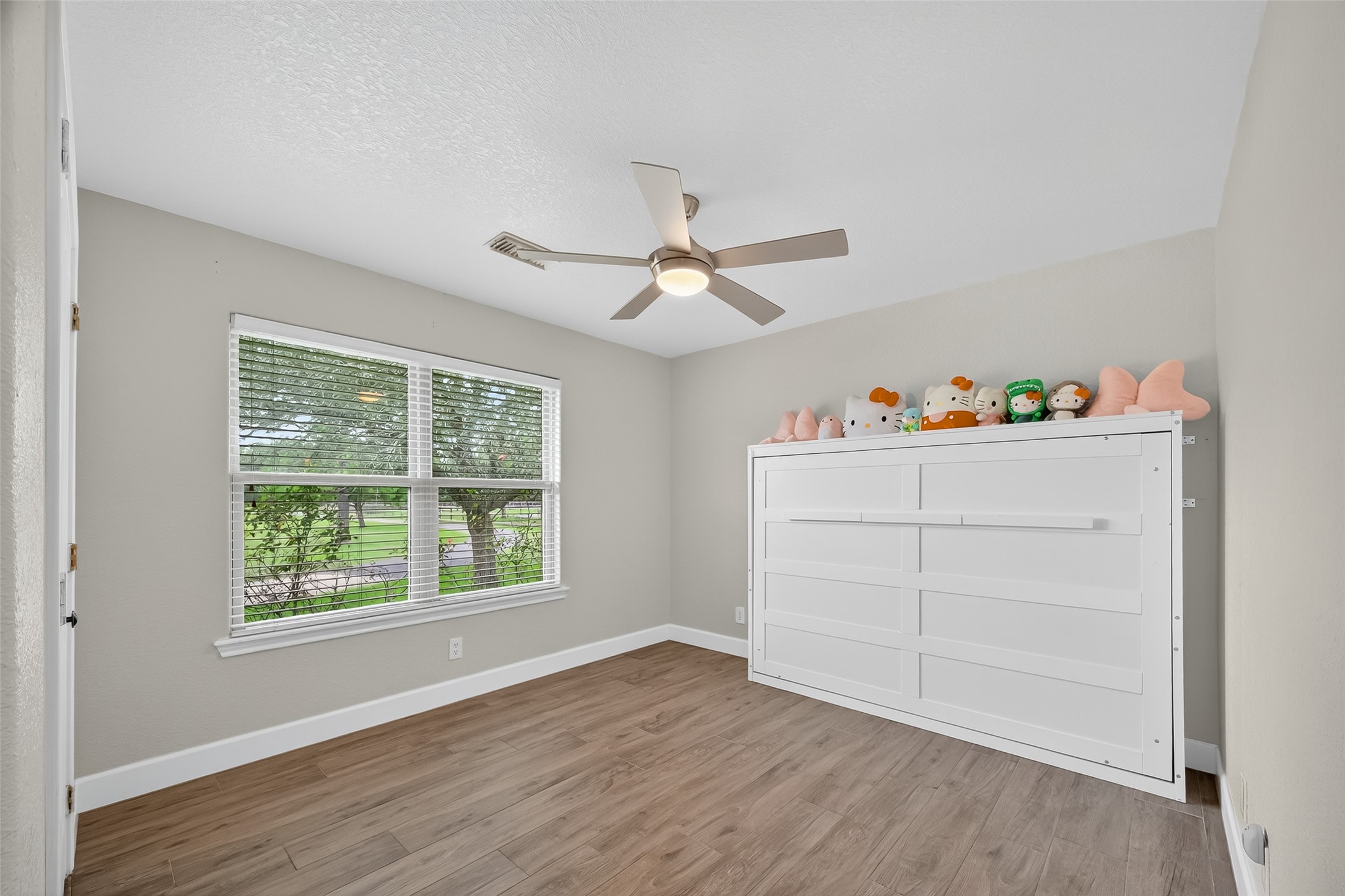 1030 Ginger Street Santa Fe, TX 77517 - Photo 20 of 50 a view of an empty room with a window