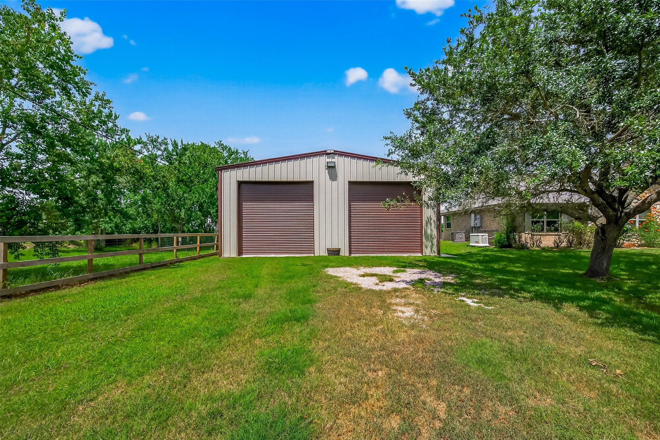 1030 Ginger Street Santa Fe, TX 77517 - Photo 28 of 50 a front view of a house with garden
