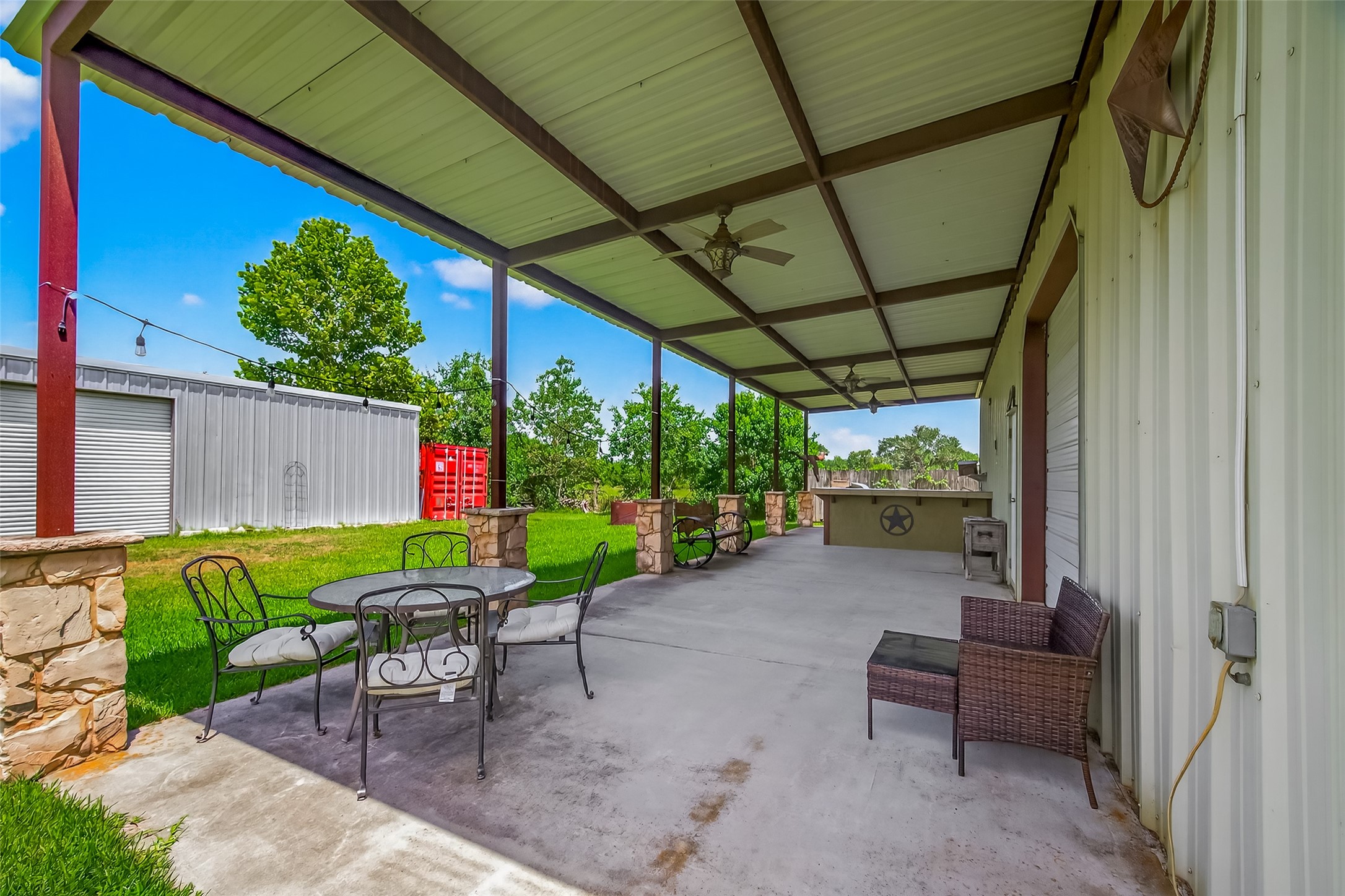 1030 Ginger Street Santa Fe, TX 77517 - Photo 37 of 50 a view of a chairs in a patio