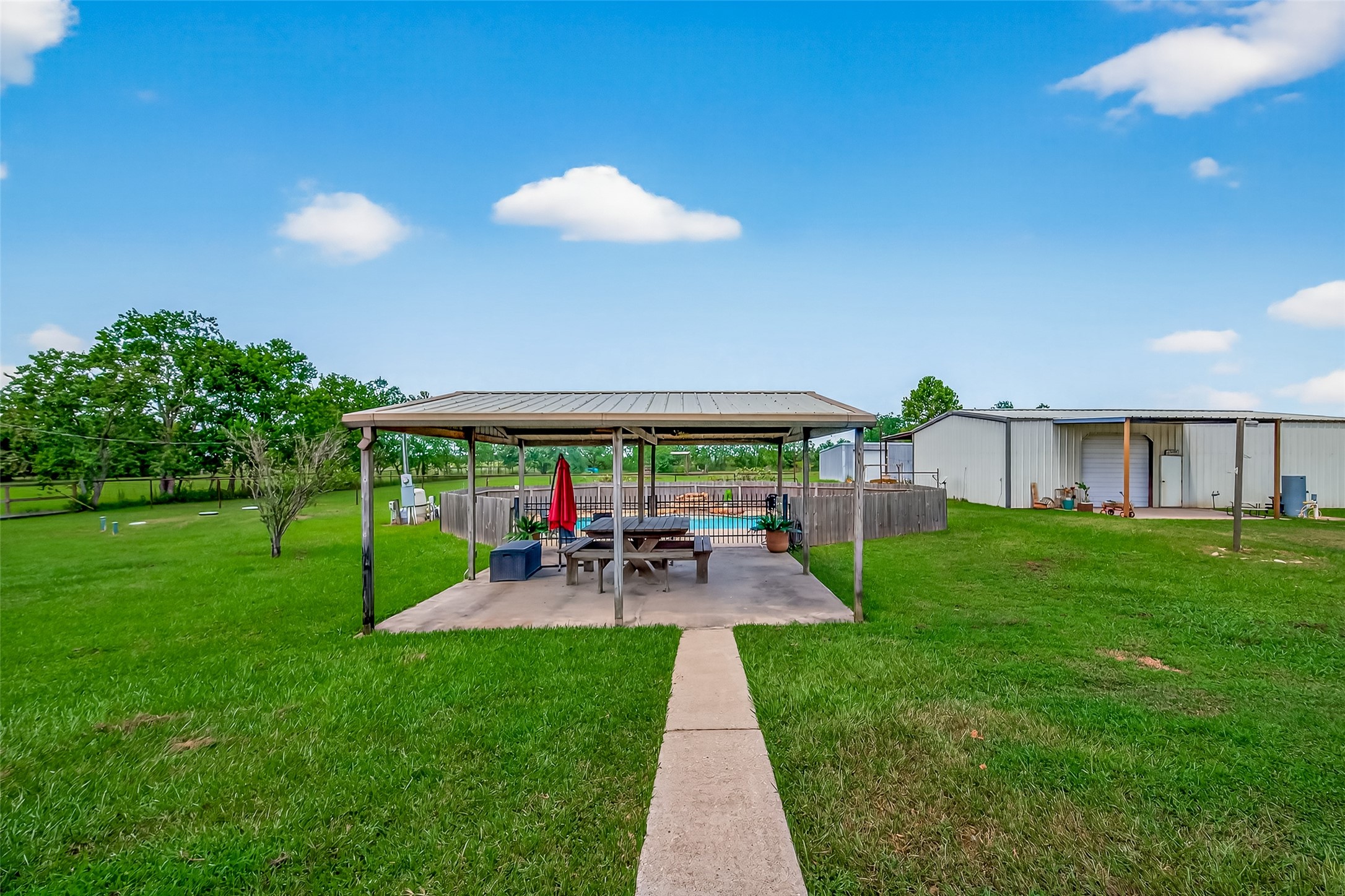 1030 Ginger Street Santa Fe, TX 77517 - Photo 41 of 50 a view of a house with a yard