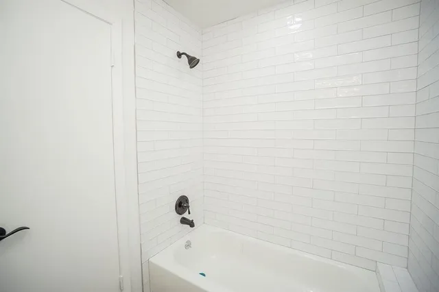 a bathroom with a bathtub