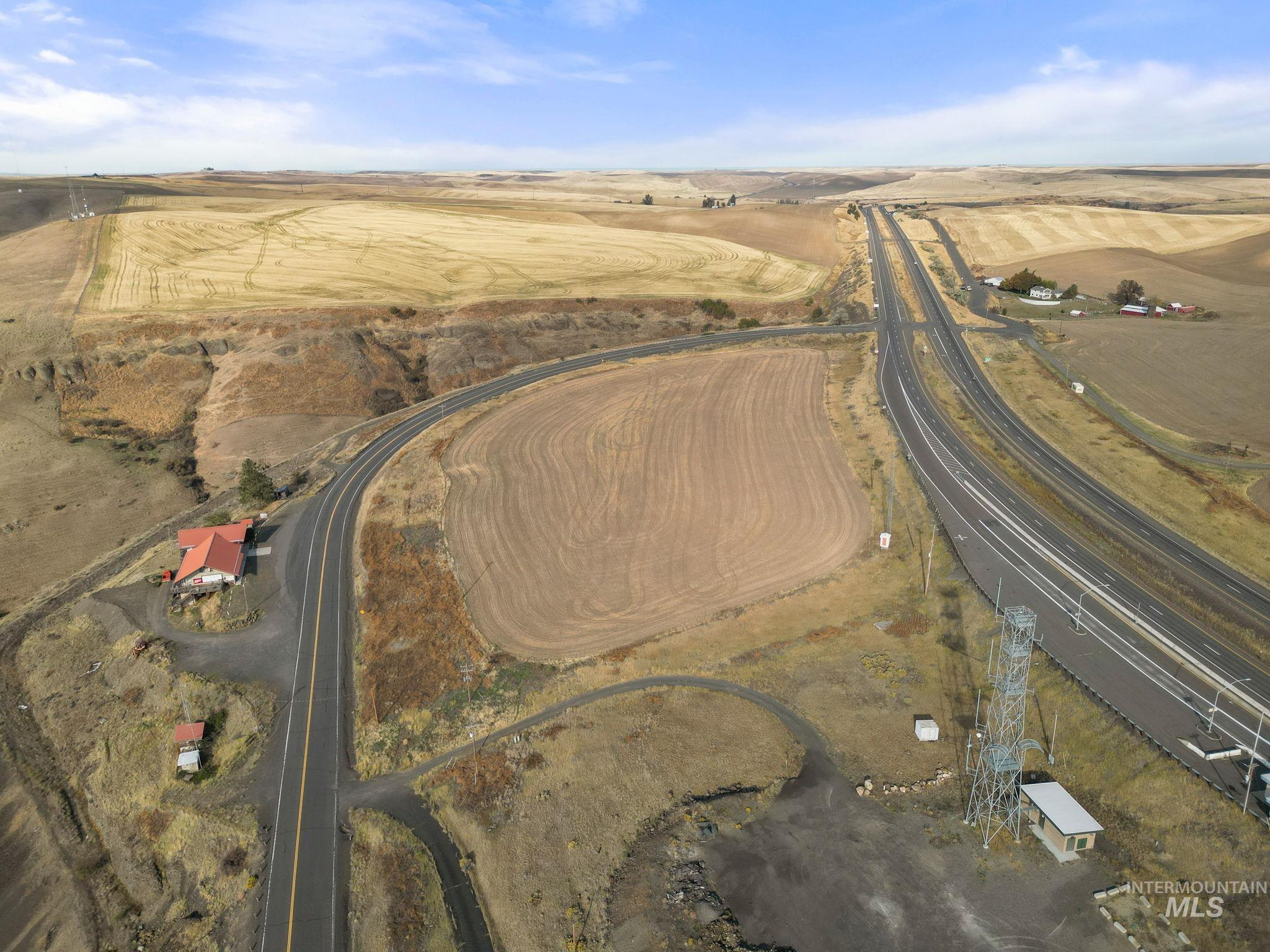 95 Lewiston Id 83501 Genesee, ID 83832 - Photo 2 of 13 Aerial view of property and surrounding area with rural landscape