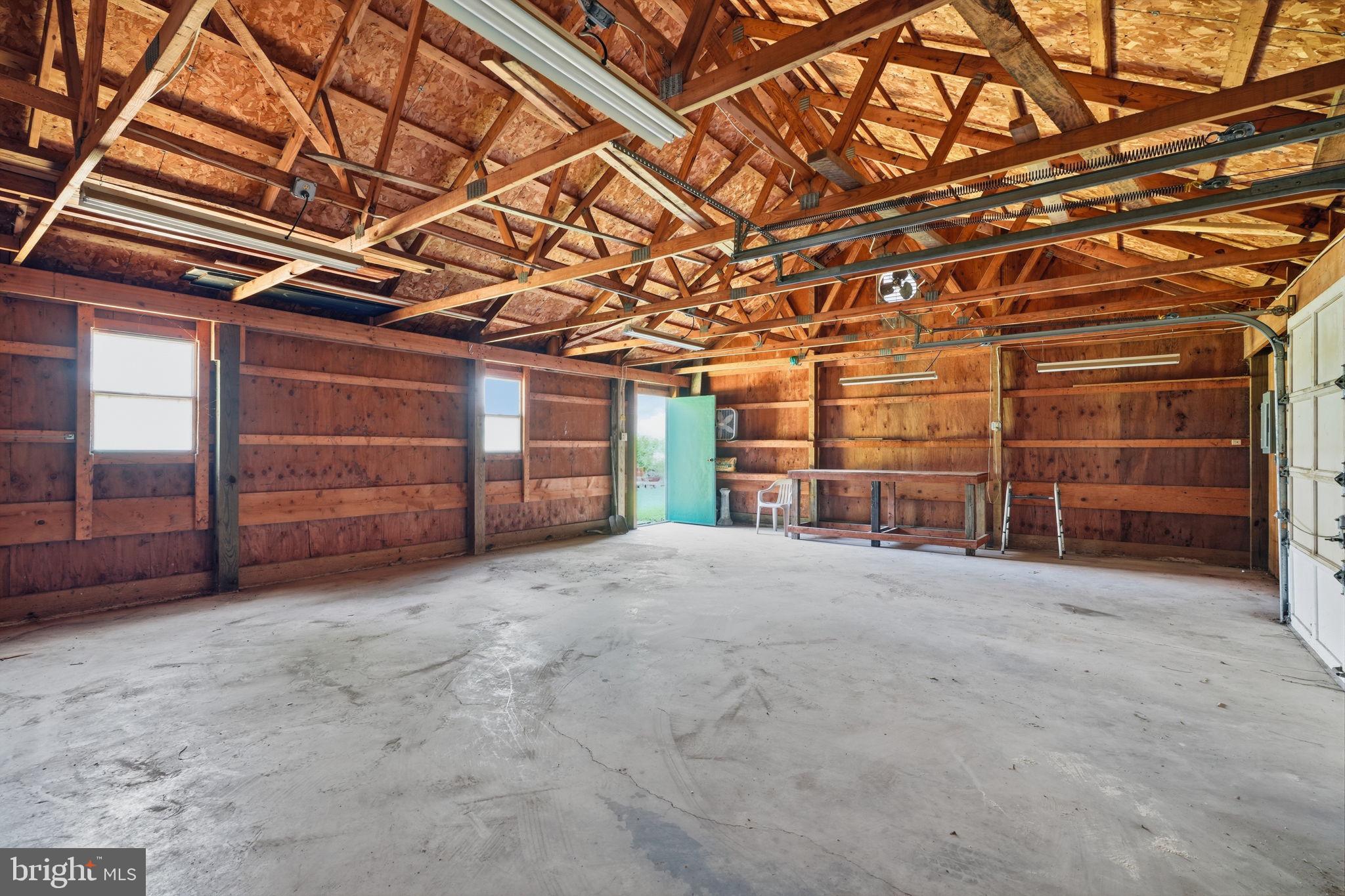 124 Cedar Road Riegelsville, PA 18077 - Photo 47 of 50 Spacious garage with rustic charm.