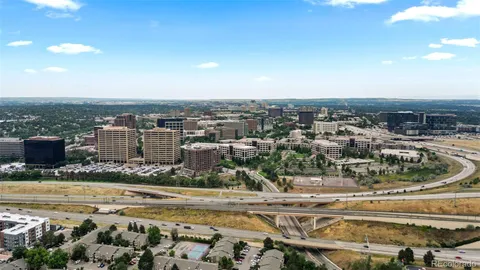 an aerial view of a city with lots of residential buildings