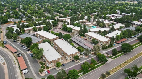 an aerial view of a house with a garden