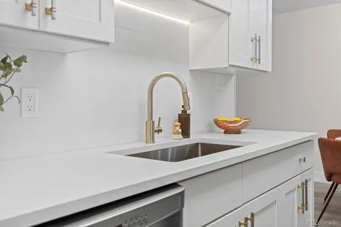 a kitchen with a stove and a microwave