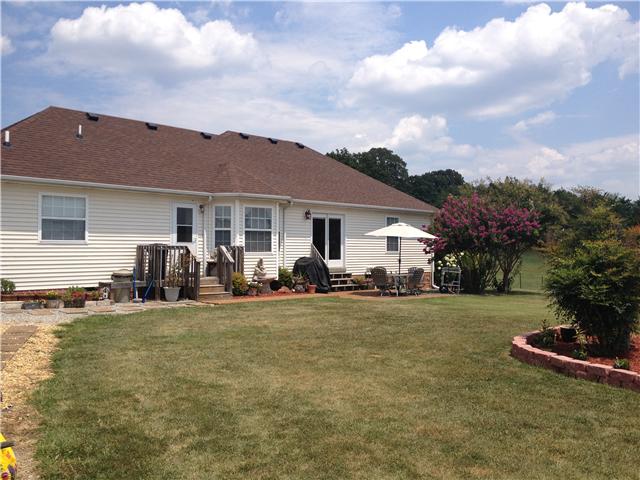 900 Denning Ford Road Portland, TN 37148 - Photo 2 of 15 This home has a lovely patio area with tons of floors and landscaping