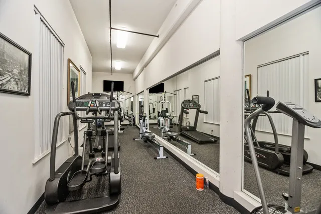 a view of a room with gym equipment