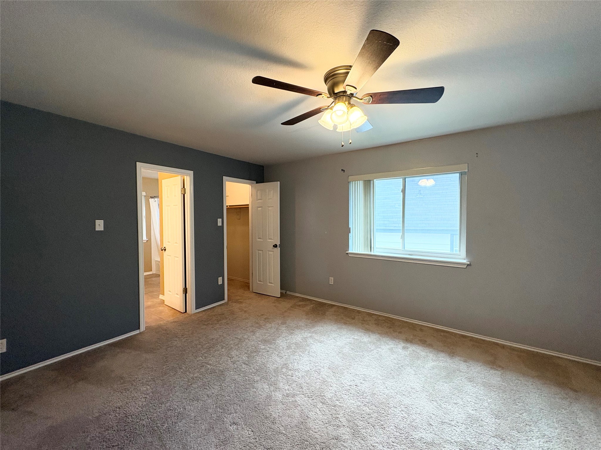 8103 Ephraim Road Austin, TX 78717 - Photo 29 of 35 A restful retreat with plush carpeting and a convenient walk-in closet.