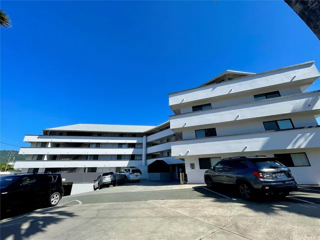 a car parked in front of a building