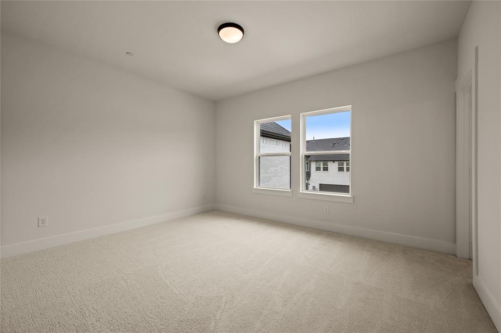 2550 Brunswick Way Allen, TX 75013 - Photo 18 of 24 an empty room with a window