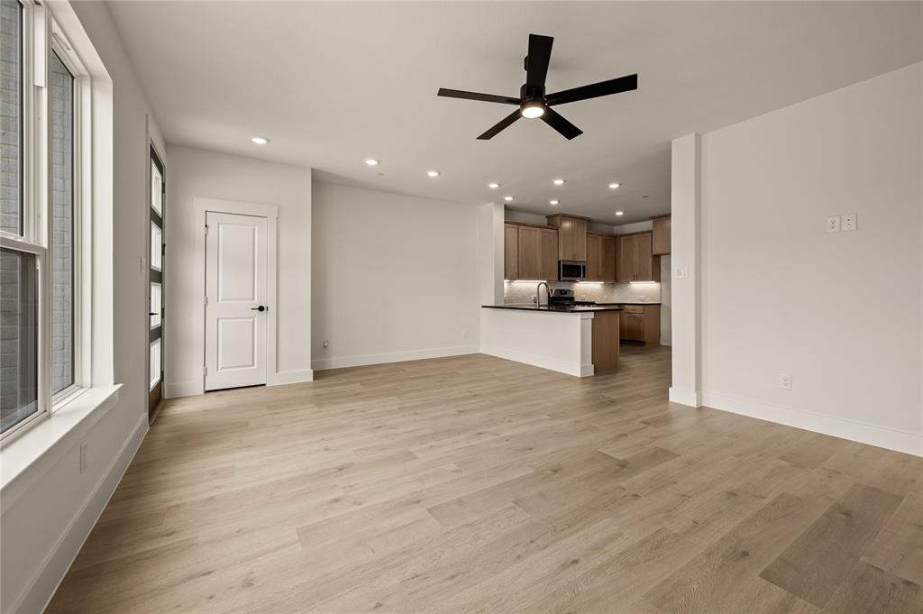 2550 Brunswick Way Allen, TX 75013 - Photo 6 of 24 a view of a kitchen with a sink and a large window