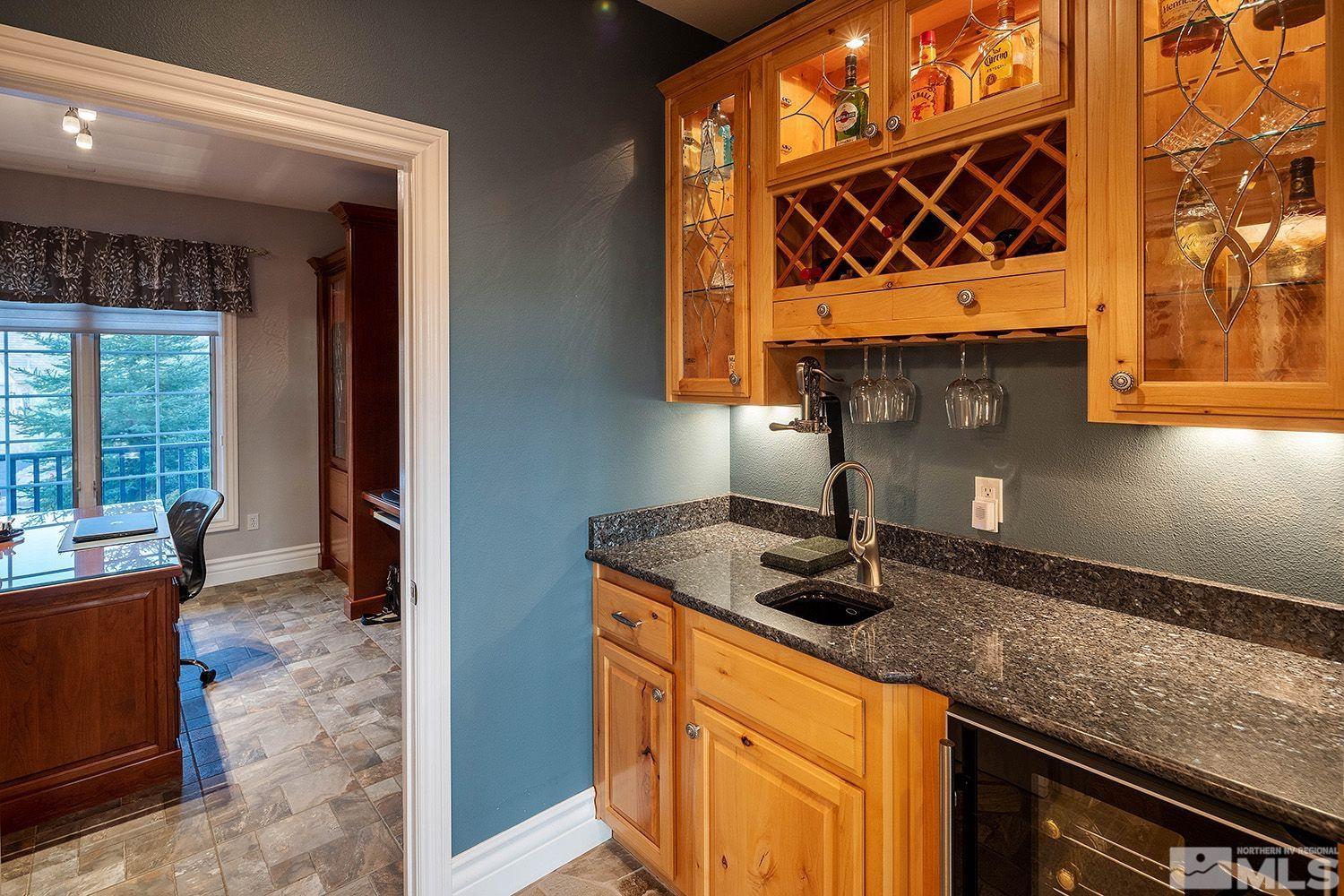 4530 Lousetown Road Reno, NV 89521 - Photo 15 of 39 a kitchen with a sink and a window