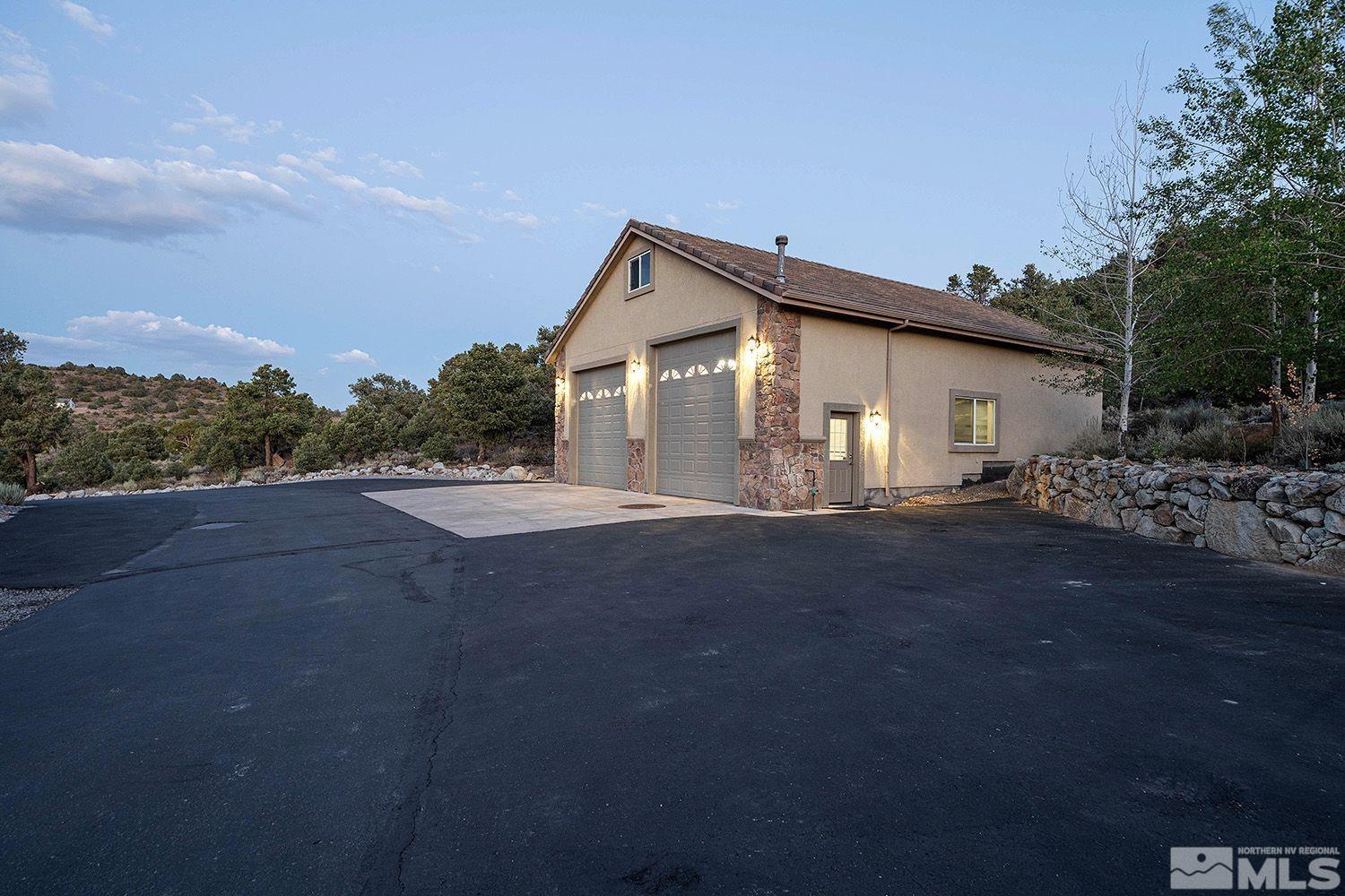 4530 Lousetown Road Reno, NV 89521 - Photo 33 of 39 a view of a house with a yard and large tree